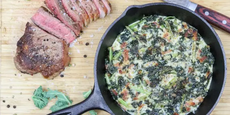 cheesy creamed kale in skillet