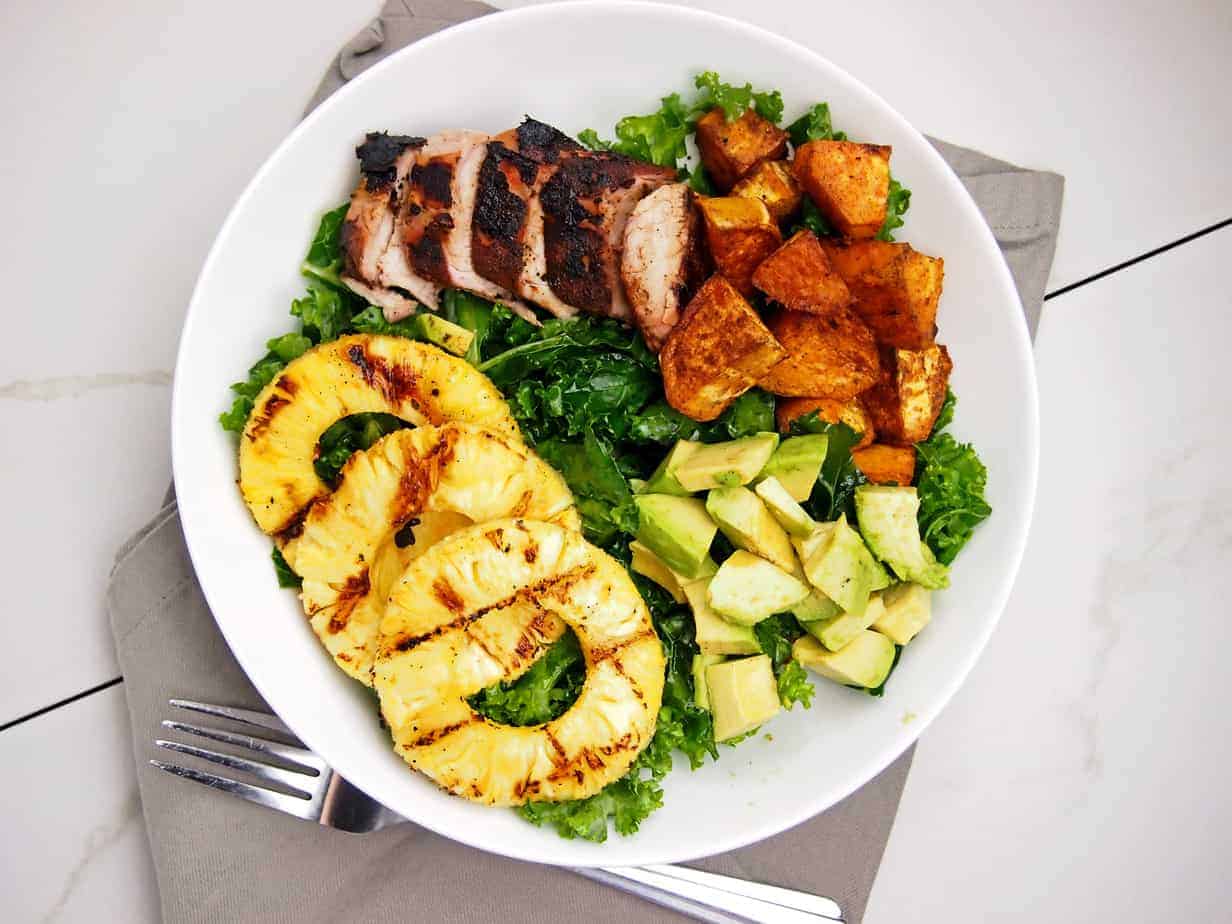 grilled pineapple jerk bowls with kale and avocado